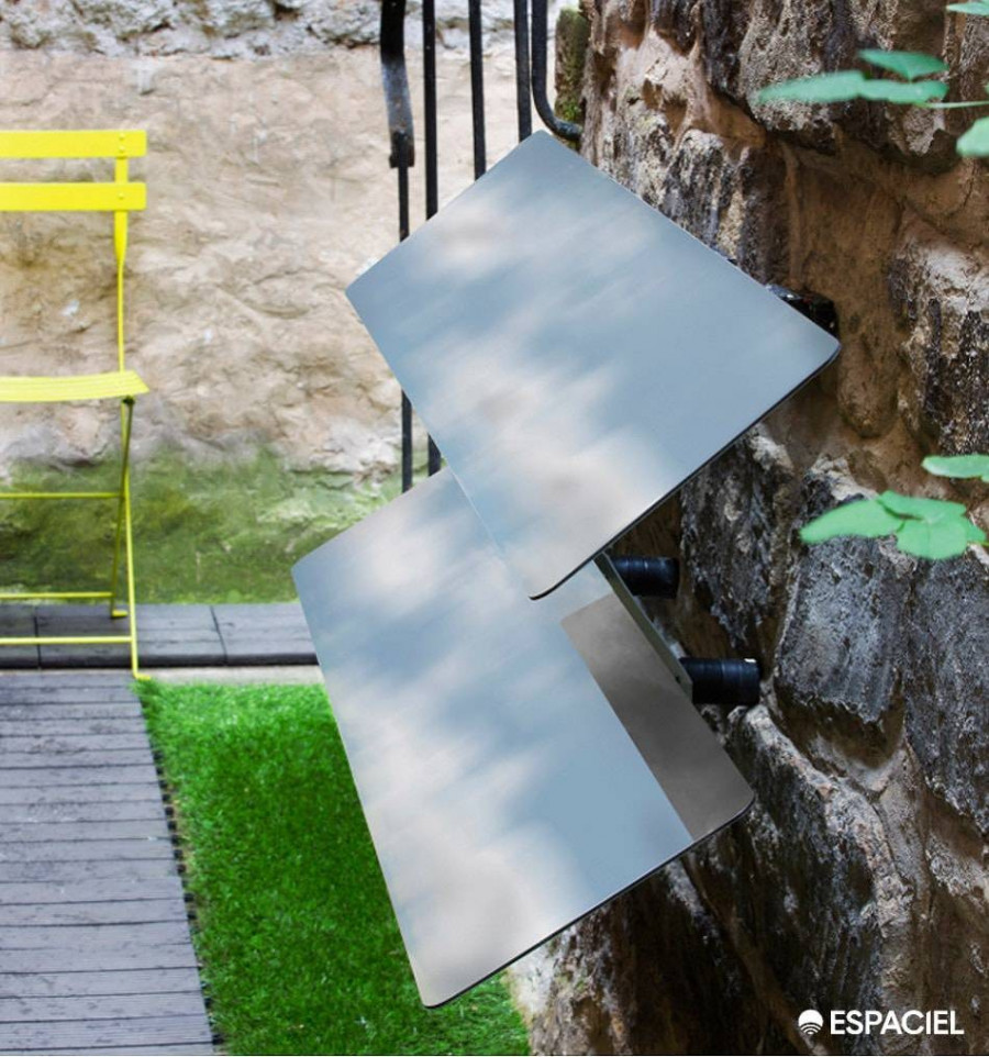 Two Espaciel Wall Reflectors installed on a stone wall