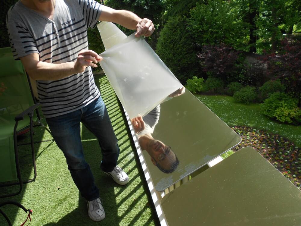 lumiere naturelle-installation-frizbiz-professionnels-en-charge-du-reflecteur-espaciel-pour-une-pose-du-produit
