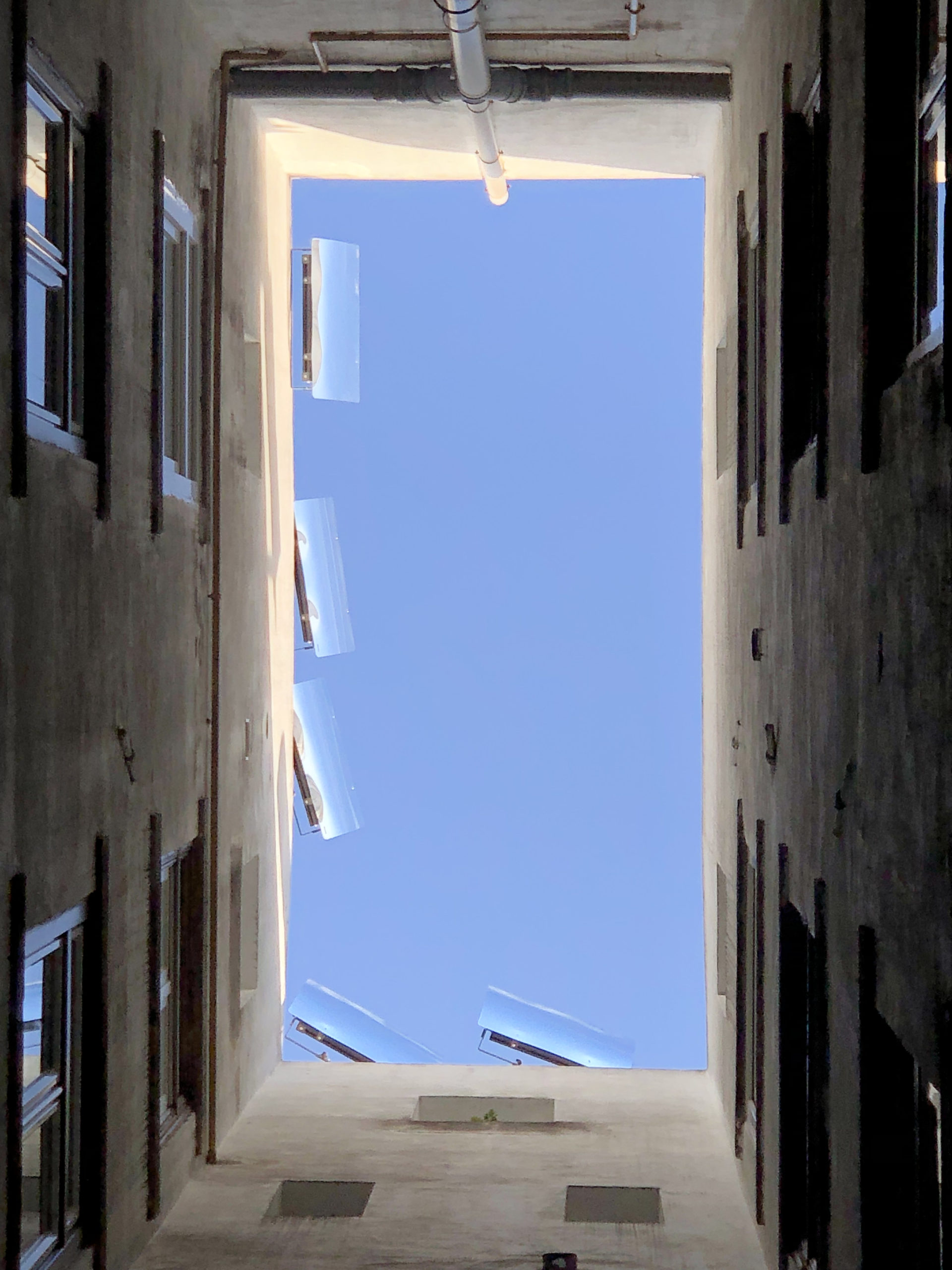 Interior courtyard in the shade in a well of light