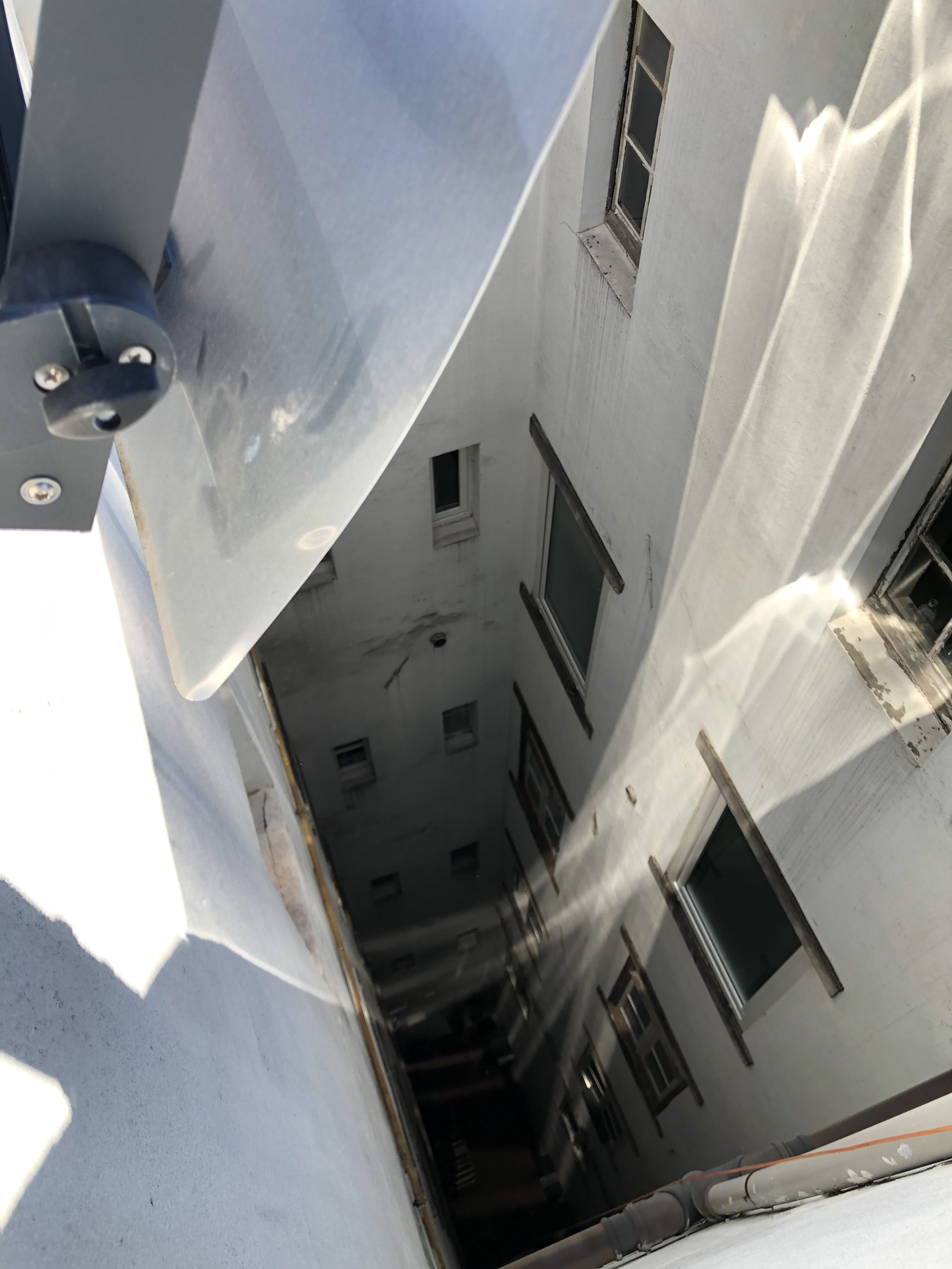 Effect of Espaciel patio reflectors on an interior shady courtyard