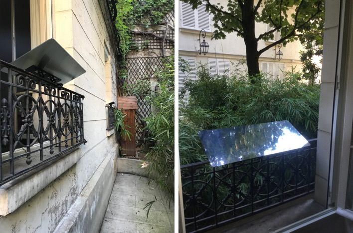 le Réflecteur Balcon mis en situation, clipser à la balustrade pour rediriger la lumière dans son salon et éclaircir la pièce naturellement